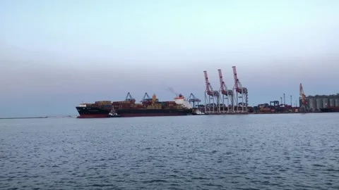 Container ship in the port. Ship with containers in the sea port. unloading a Video stock 201528362