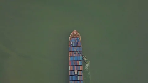 Container Ship Pushed By Tug Boats into port 2 Stock Footage