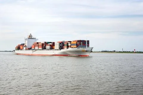 Container ship on river elbe Stock Photos