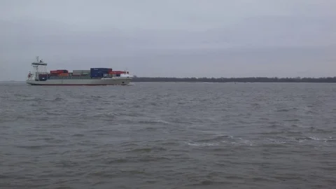 Container ship on a river Stock Footage 84992864