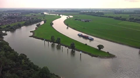 Container ship on the river IJssel in The Netherlands to the Port of Rotterdam Stock Footage 159501612