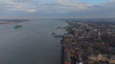 Container ship on river Thames by Gravesend town aerial view Stock Footage 327158434