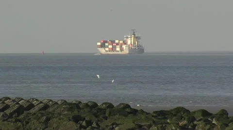 Container ship sailing pull out to lighthouse on River Mersey.mp4 Video stock 21926160