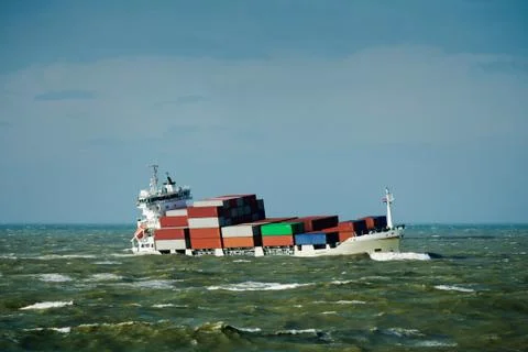 Container ship sailing through a storm, Rotterdam, South Holland, Netherlands, Stock Photos