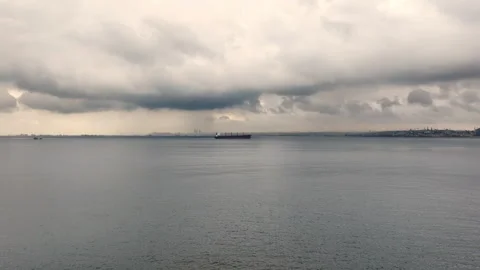 Container ship sails along the Bosphorus, against the background of Istanbul. Stock Footage 324910791