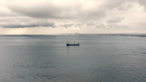 Container ship sails along the Bosphorus, against the background of Istanbul. Stock Footage 324911041