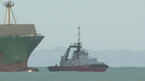 Container ship side on in swell Stock Footage 377349
