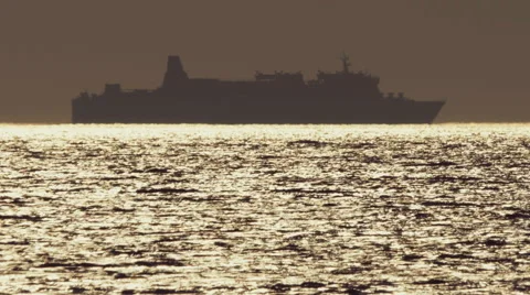 Container ship silhouette, far in the middle of the ocean Stock Footage 66523512