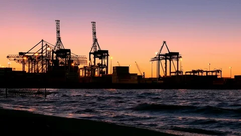 Container Ship Terminal and Cranes in the Evening Stock Footage 97182321