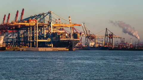 Container ship on terminals in the evening hyperlapse, tracking shot, timelapse Stock Footage 50072937