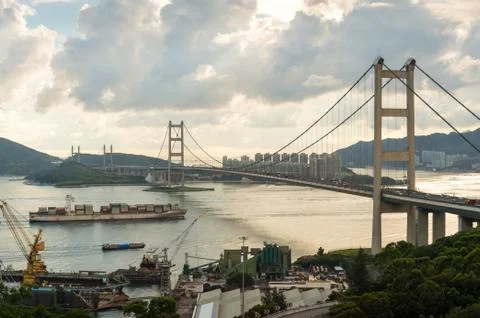 Container ship through under tsing ma bridge, hongkong Stock Photos