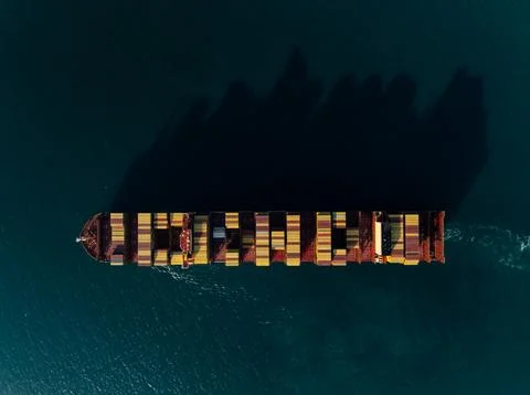 Container Ship Transporting International Cargo Across Gulf Of Thailand Nea.. Stock Photos