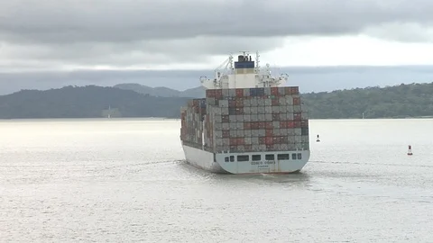 Container ship underway transiting Lake Gatun in the Panama Canal Stock-Footage 90427379