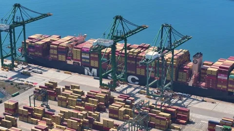Container ship unloading at major port Stock Footage 335523632
