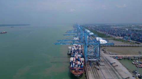 Container ship unloading operations Port Klang. Spectacular aerial view drone Stockbeeldmateriaal 331577515