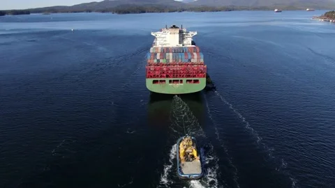 Container ship XIN Los Angeles and tug boat drone shot entering port 4K Footage Stock Footage 149209593