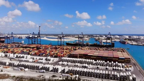 Container Shipment Port Entry and Industrial Terminal Aerial, Bahamas Stock Footage 104021546
