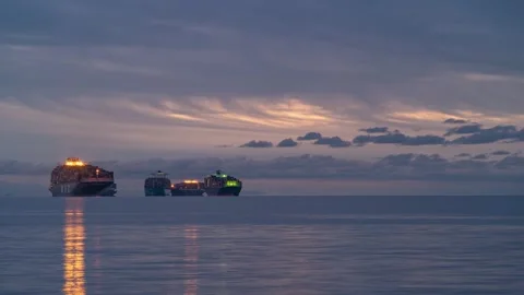Container ships on dusky horizon time lapse Stock Footage 237718422