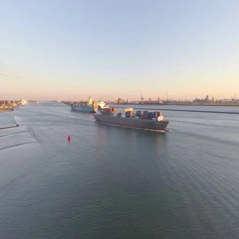 Container ships pass each other in port (drone 4k) Video stock 69584217