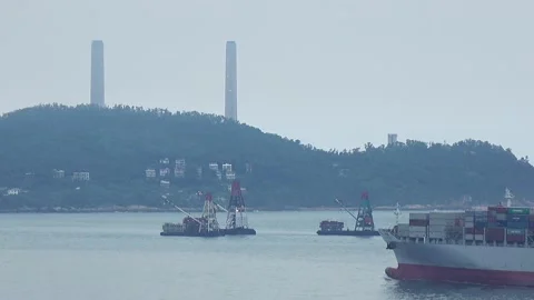 Container ships transporting cargo into Hong Kong from China. Stock Footage 131217799
