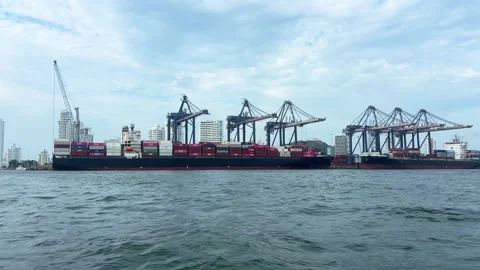 Container Ships Unloading Cargo at Cartagena Bay Terminal 動画素材 345112240