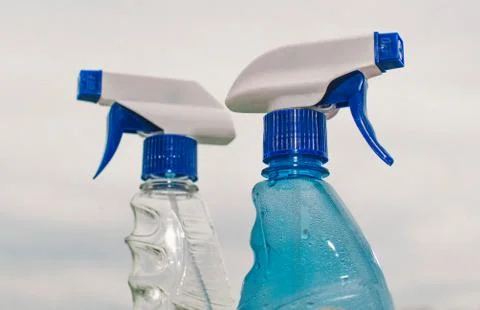 Container with a sprayer for washing windows Stock Photos