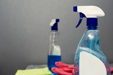 Container with a sprayer for washing windows Stock Photos