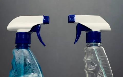 Container with a sprayer for washing windows Stock Photos