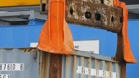 Container Spreader and Lifting container  4k intro video for business Stock Footage 89250064