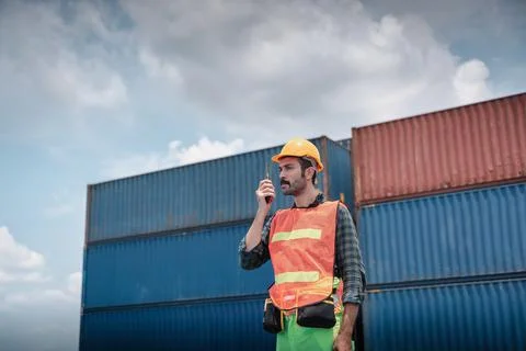 Container Supervisor Control Import/Export While Inspecting Containers Box in Stock Photos