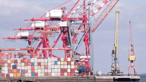 Container terminal and cranes loading cargo ships timelapse. Lisbon, Portugal. 動画素材 290006506
