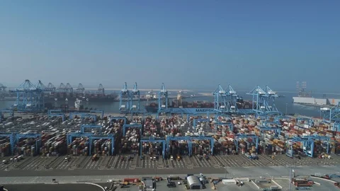 Container terminal with cargo ships moored for loading and unloading freight Stock Footage 113213210