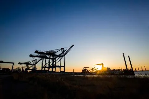 Container terminal in the evening Stock Photos