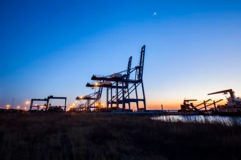 Container terminal in the evening Stock Photos