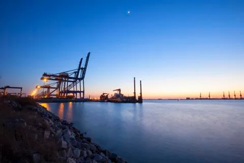 Container terminal in the evening Stock Photos