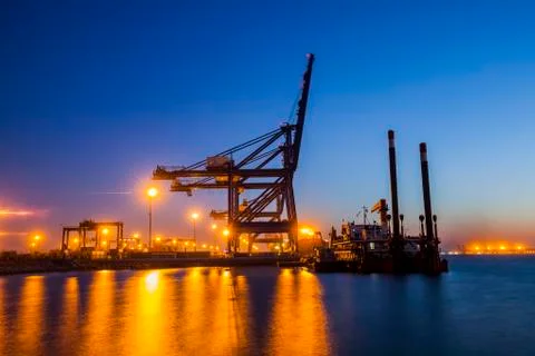 Container terminal in the evening Stock Photos