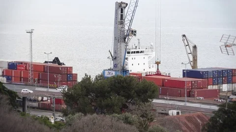 Container Terminal With Huge Cranes Next To Highway Stock Footage 76609913