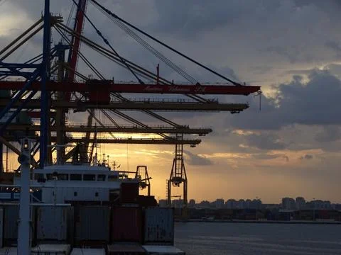 Container Terminal Operation at Twilight Stock Photos