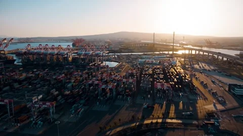 Container terminal operations at Port of Los Angeles during sunset hours Vídeos de archivo 337002519