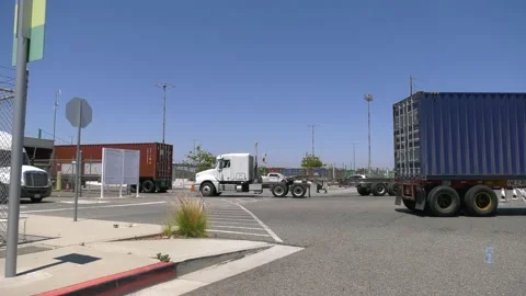 Container Terminal Shipping Containers on trucks Stock Footage 158183878