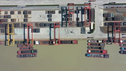 Container terminal with solar panels on factroy rooftop Stock Footage 166231880