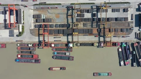Container terminal with solar panels on factroy rooftop Stock Footage 166231906