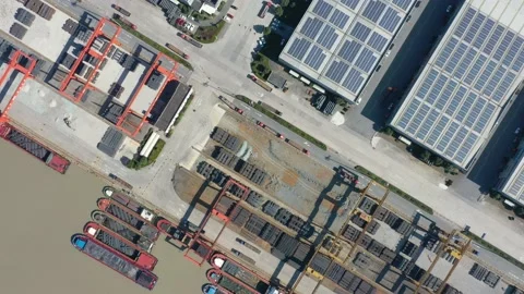Container terminal with solar panels on factroy rooftop Stock Footage 166231923