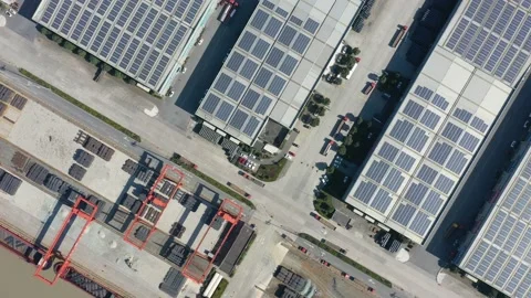Container terminal with solar panels on factroy rooftop Stock Footage 166231979