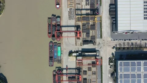 Container terminal with solar panels on factroy rooftop Stock Footage 166234235