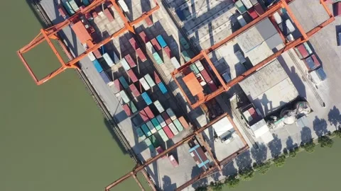 Container terminal with solar panels on factroy rooftop Stock Footage 166385651