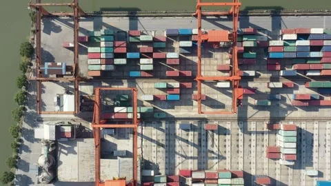 Container terminal with solar panels on factroy rooftop Stock Footage 166385868