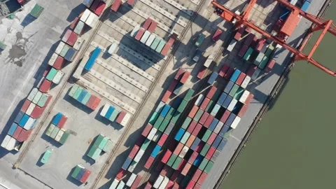 Container terminal with solar panels on factroy rooftop Stock Footage 166386105