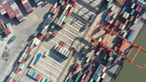 Container terminal with solar panels on factroy rooftop Stock Footage 166386151