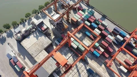 Container terminal with solar panels on factroy rooftop Stock Footage 166386846